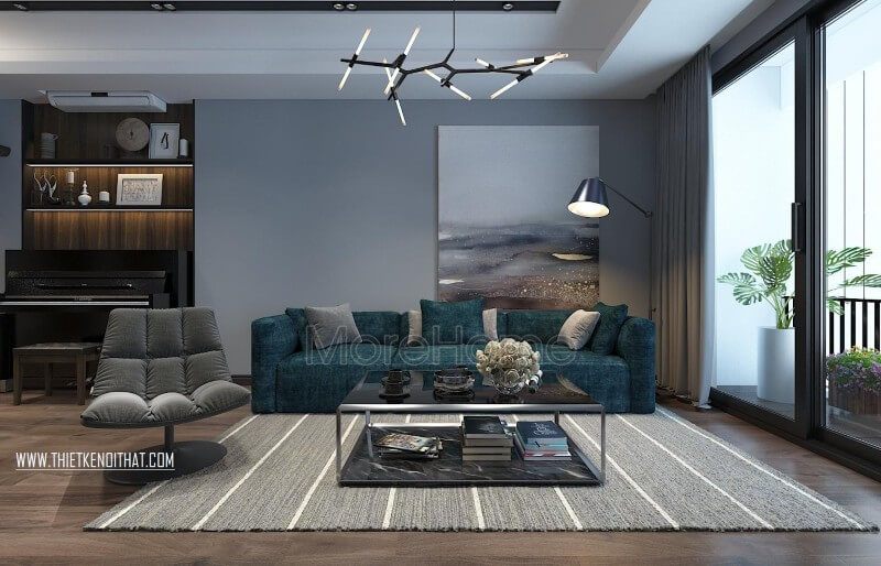 Sofa bọc nỉ với gam màu xanh tươi mát là điểm nhấn cho cả không gian