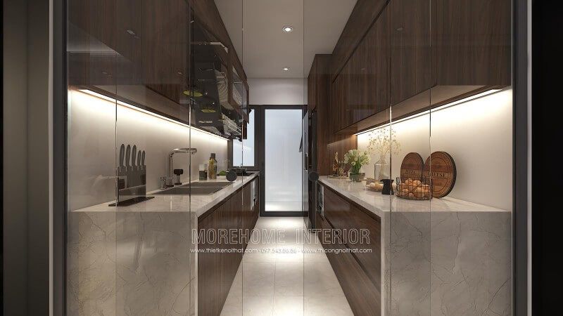 . Gia chủ đã chọn thiết kế tủ bếp đẹp riêng biệt với khu vực sinh hoạt khác, và sử dụng cửa kính cường lực để giữ lại mùi dầu mỡ trong tủ bếp, để tránh ảnh hưởng đến các không gian khác.